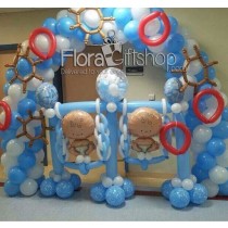 Double Swings Under A Blue Arch Balloons